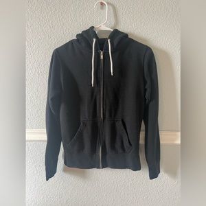 Cute black zip-up jacket. Size small.